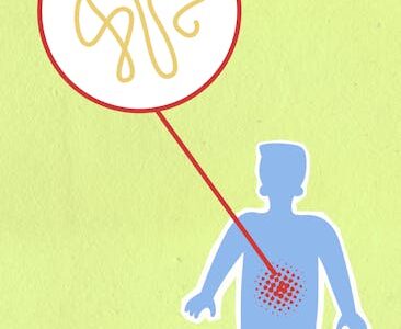 Cardboard illustration of sick human figure with genetic material in organism on green background