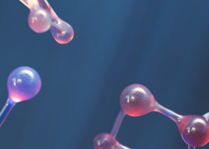 Abstract image of connected molecular shapes with vibrant colors.